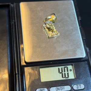 4 GRAMS OF 18KARAT JESUS PENDANT