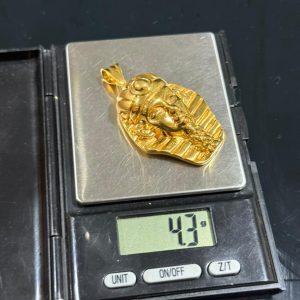 4.3 GRAMS OF 18KARAT PHARAOH PENDANT