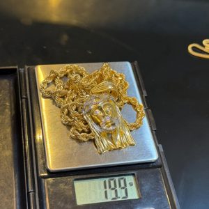 18KARATS PURE GOLD TWIST CHAIN AND JESUS PENDANT