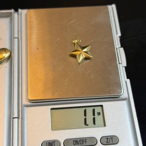 1.1 GRAMS OF 18KARAT STAR PENDANT