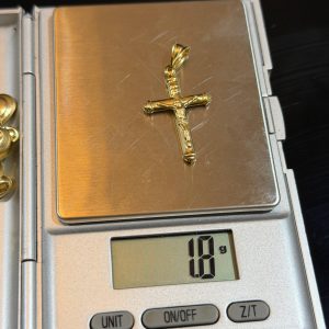 1.8 GRAMS OF 18KARAT CROSS PENDANT