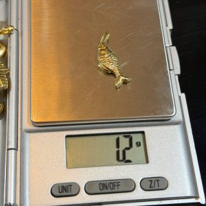 1.2 GRAMS OF 18KARAT FISH PENDANT