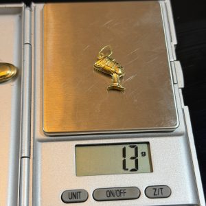 1.3 GRAMS OF 18KARAT NEFETITI PENDANT